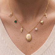 The mini charm necklace worn